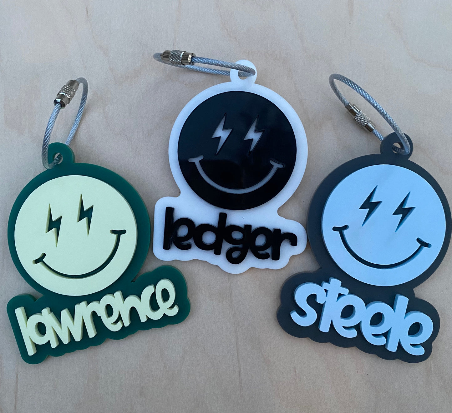 Smiley Face Lightning Bolt Keychains